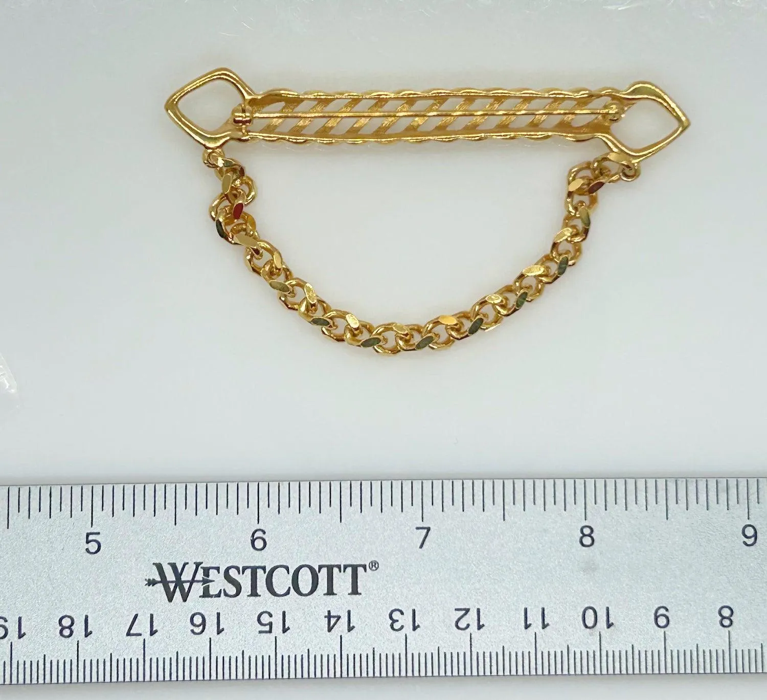 Dramatic Draped Chain Gold Tone Brooch