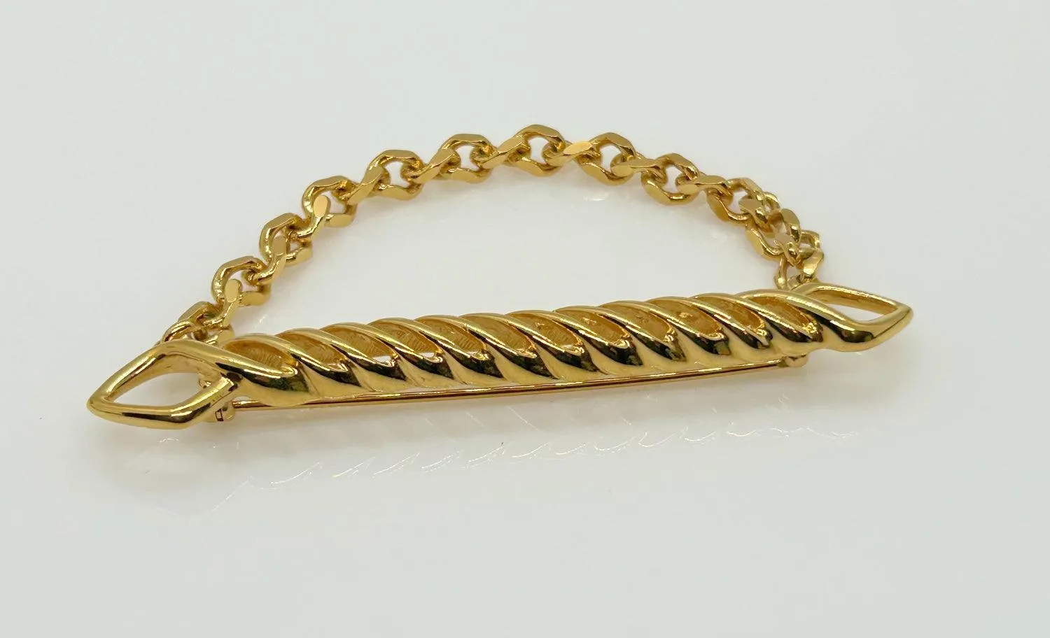 Dramatic Draped Chain Gold Tone Brooch